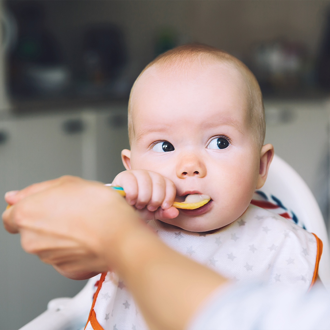 Baby being fed